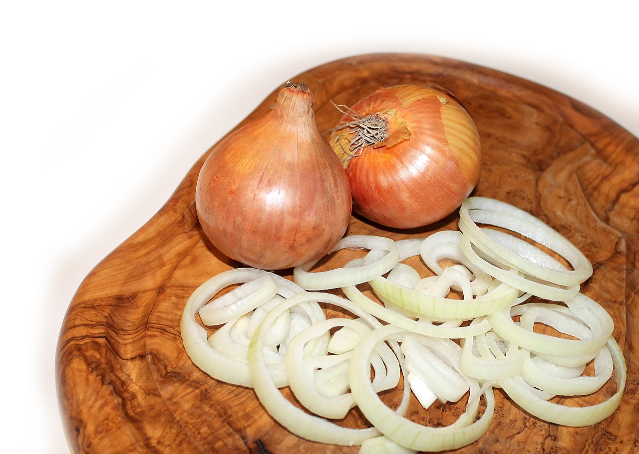 Sauté chopped onions until golden brown. - The Role of Ghee in Vegan and Dairy-Free Diets